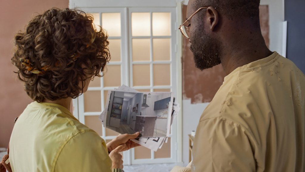 Discussing Home Renovation Plans in Modern Living Room